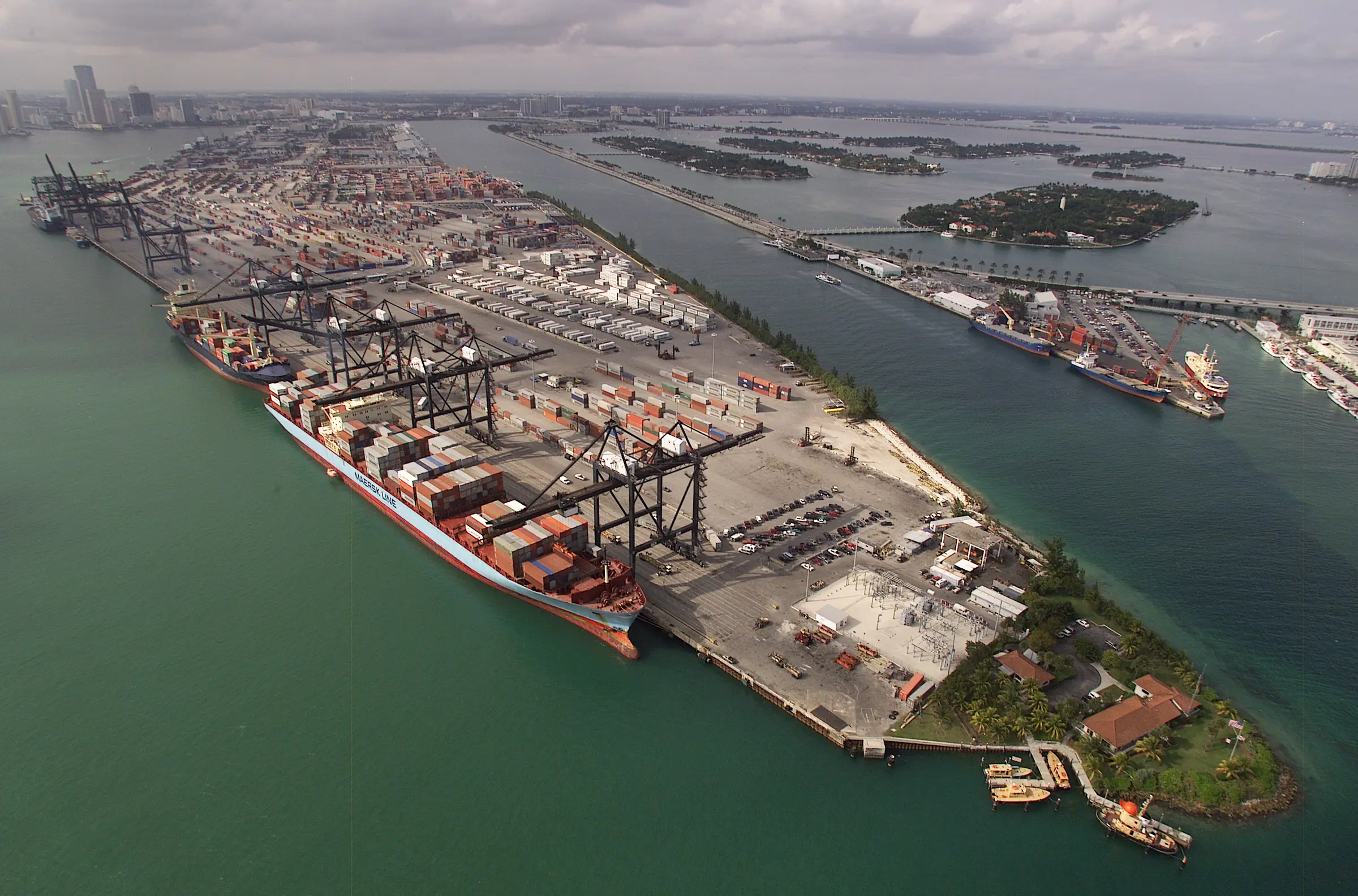 Aerial view of a US container port with cranes and cargo ships